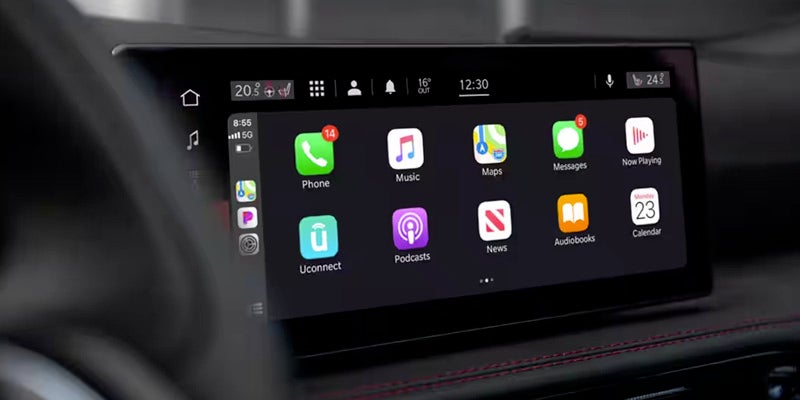 Close- up image of the 2024 Dodge Hornet infotainment system, turned on to show the home screen